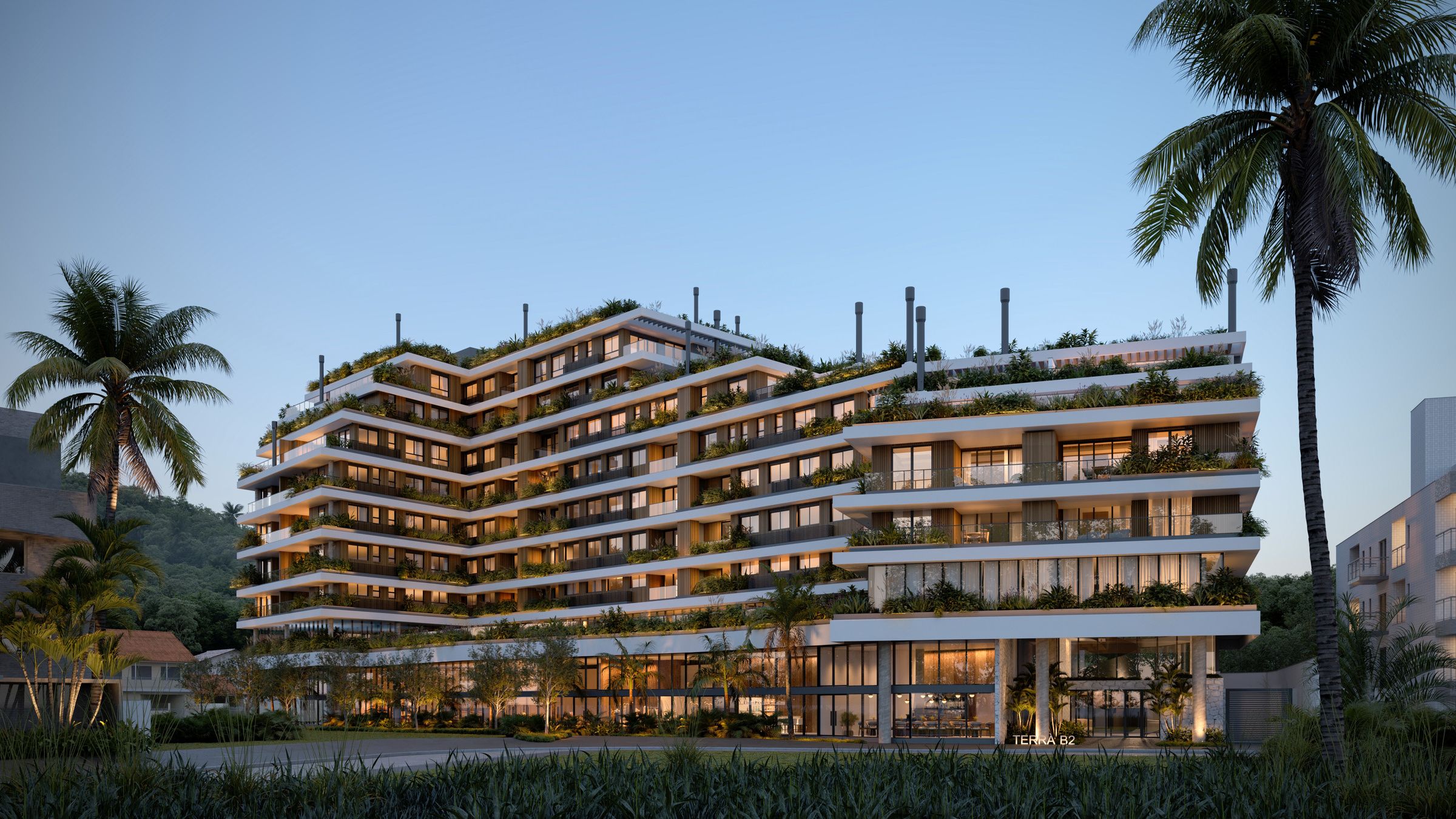 Terrá Jurerê — fachada principal con jardín tropical y palmeras, Jurerê, Florianópolis